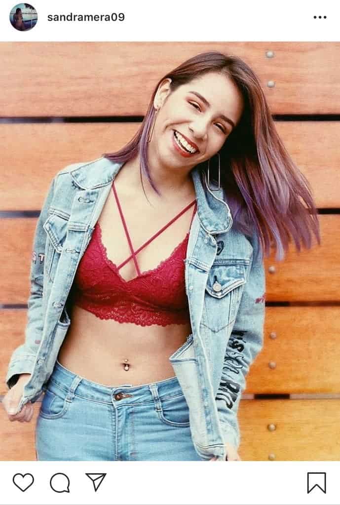 Red strappy bralette with denim jacket
