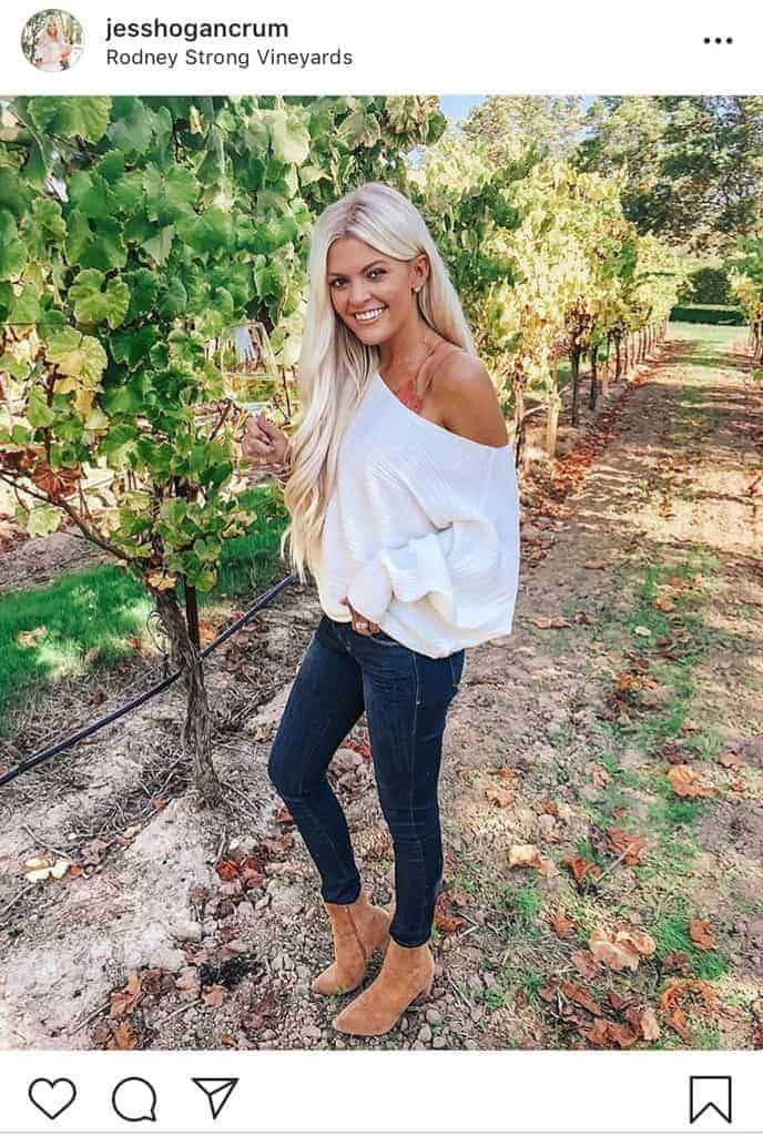 White off shoulder top with jeans and bralette