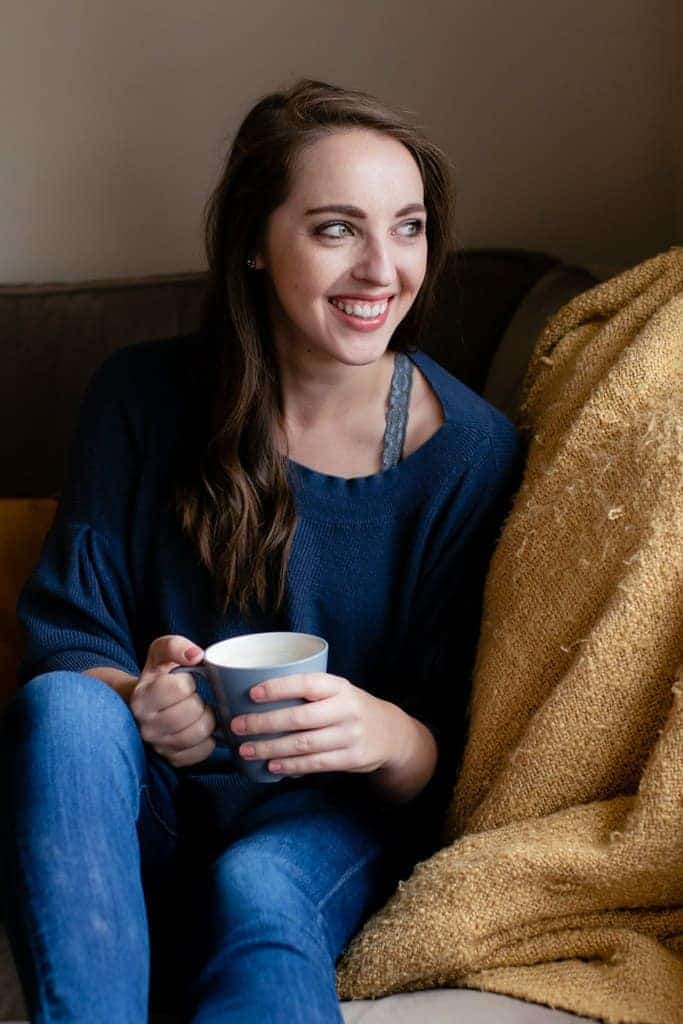 Gray bralette under blue sweater