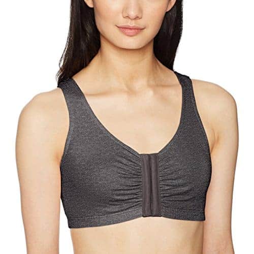 Close up image of a woman wearing a black Fruit of the Loom front close builtup sports bra