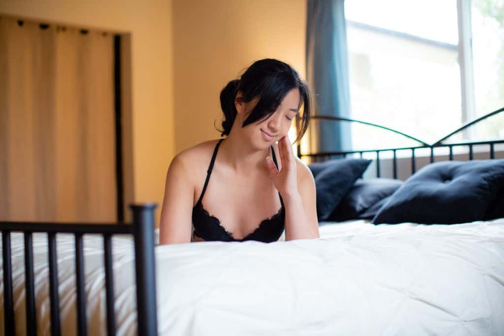 Woman wearing a Natori sheer convertible contour plunge bra