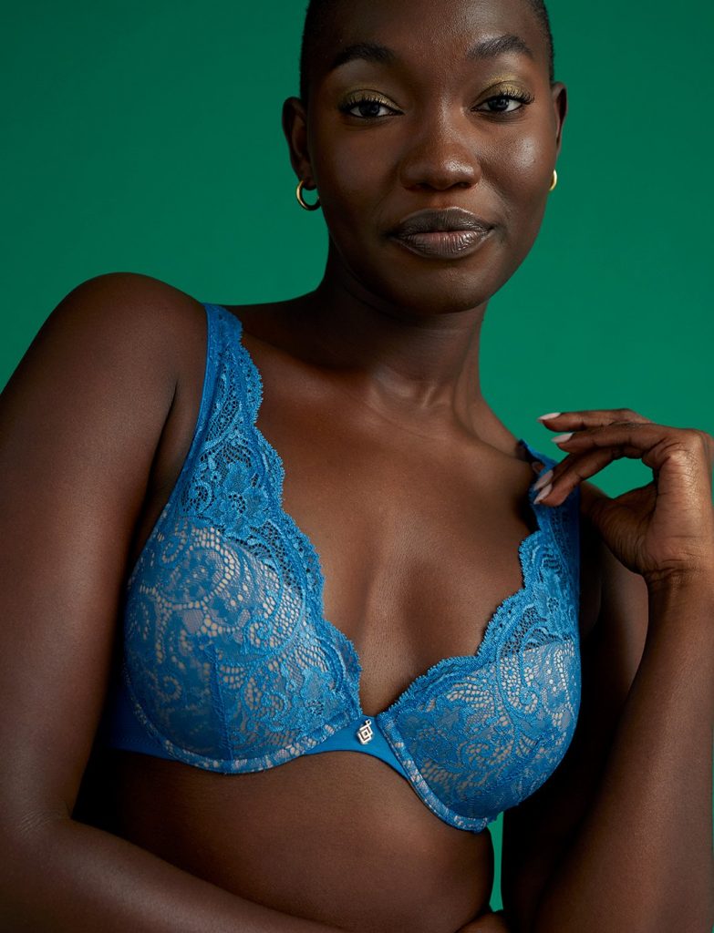 Woman wearing a blue laced bra