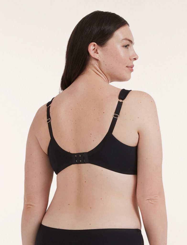 Woman wearing a black colored bra