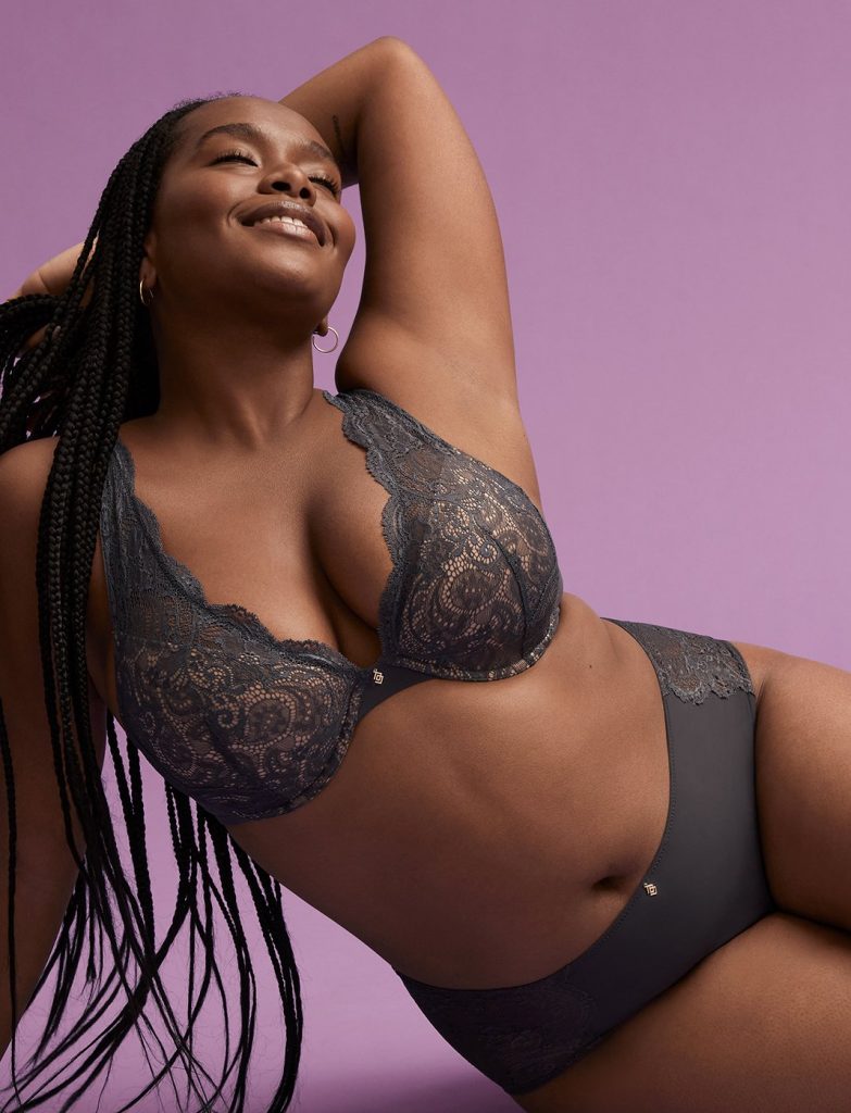 Woman wearing a black laced bra from Third Love