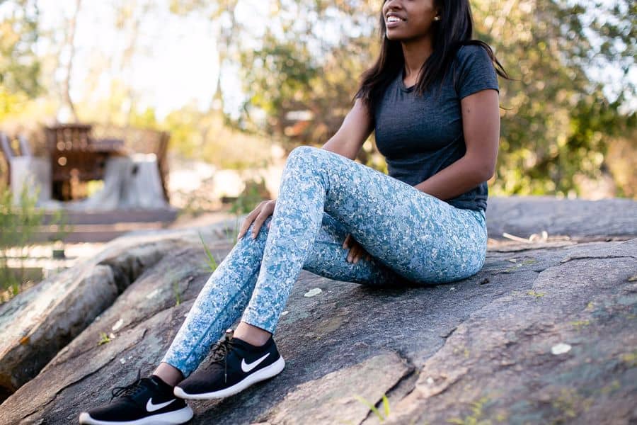 Woman wearing a tight shirt and leggings