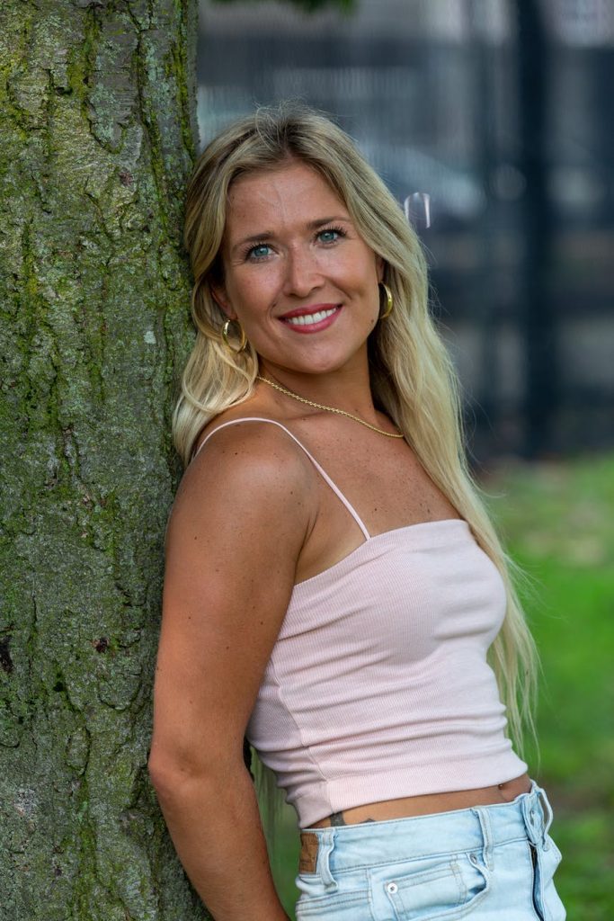 Woman wearing a pink spaghetti strap top