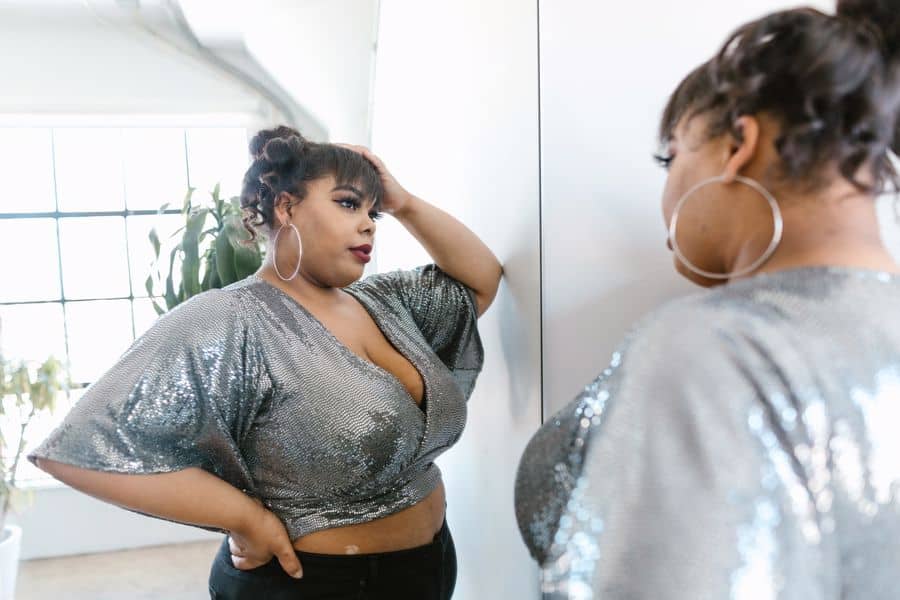 Woman wearing a sequined crop top