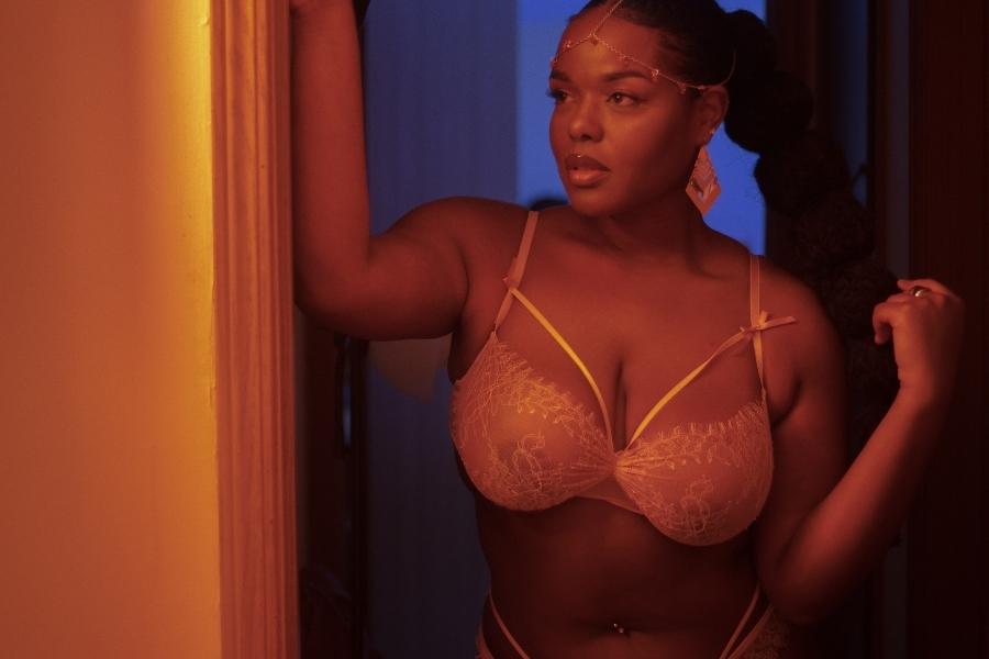 A woman wearing a laced bra