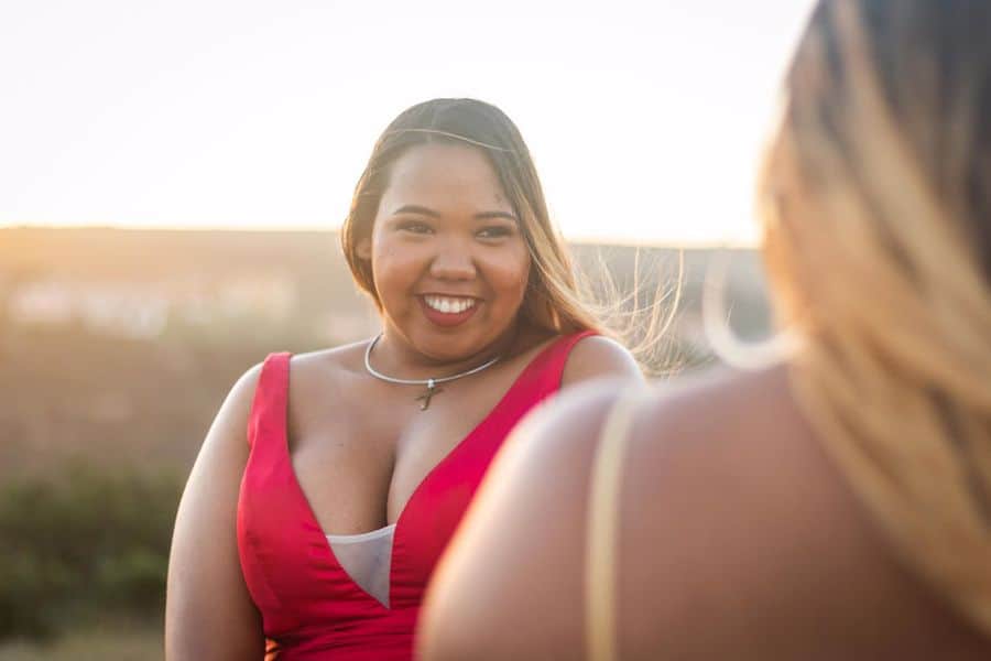 Woman wearing a red low cut dress
