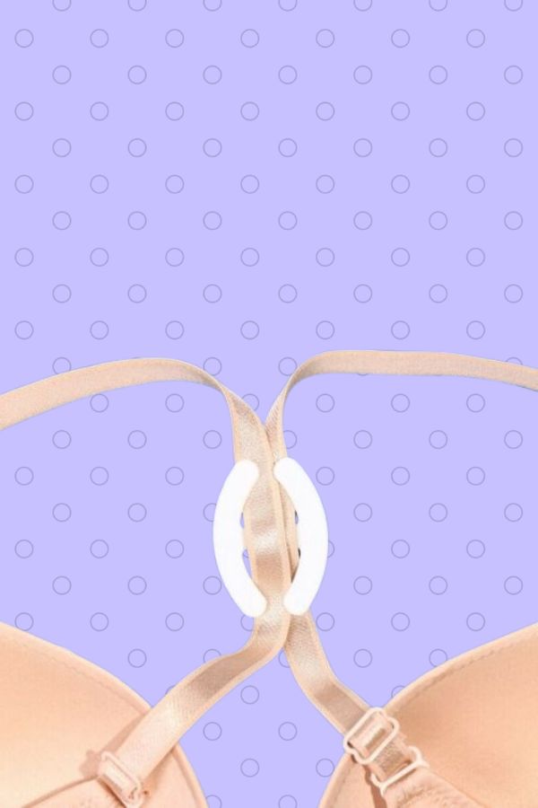 White bra clip attached to bra straps