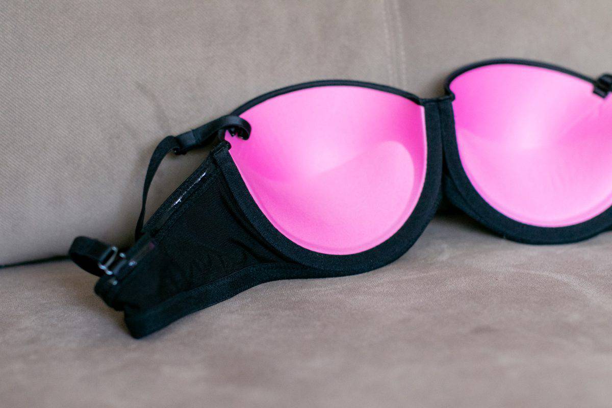 A pink and black push up bra