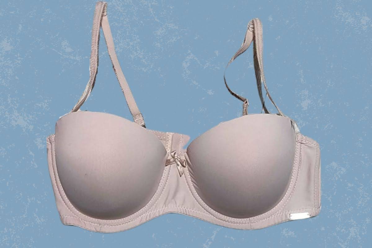 A white push-up bra with an underwire and a white ribbon at the center