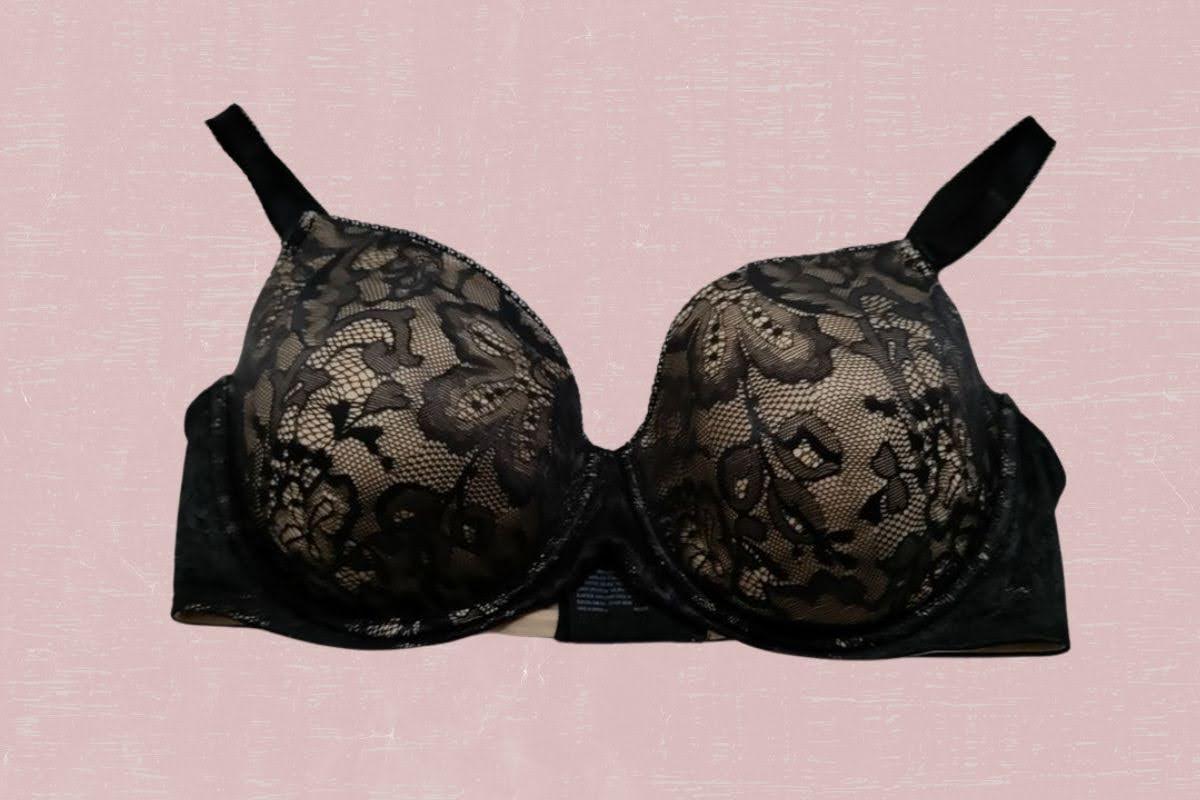 A black full-coverage underwire bra with floral lace design and wide straps and bra band