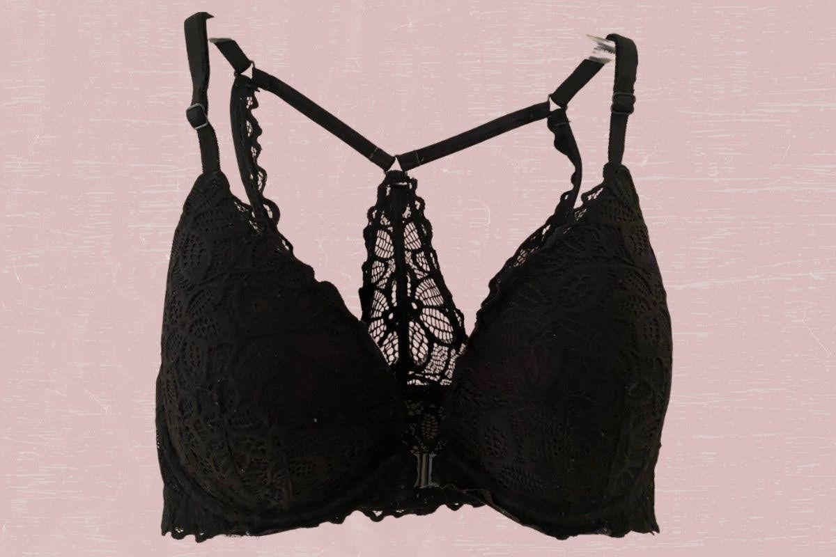 A black full-coverage racerback bra with a front clasp and floral lace design