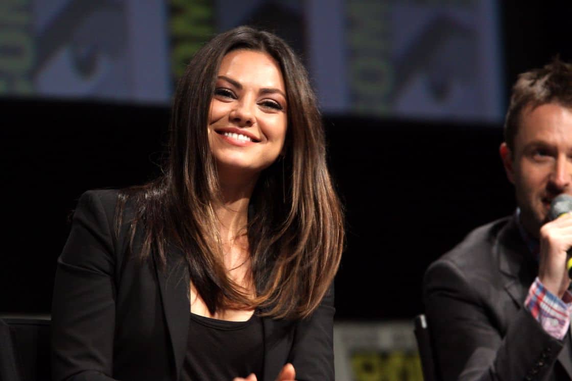 Mila Kunis wearing a black blazer and shirt at SDCC