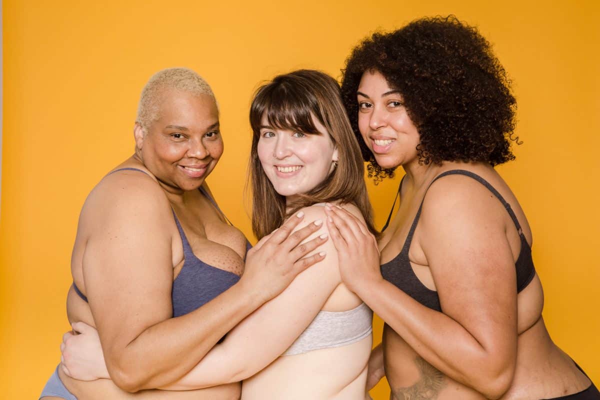 Three women wearing bra