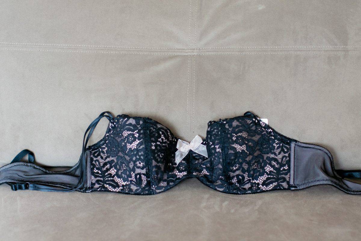 A black balconette bra